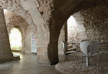 Globus chairs with Zero table in the stone made cave
