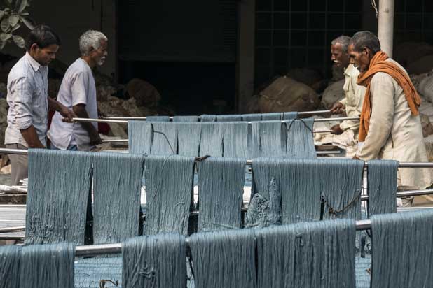 Craftspeople making rugs for Nani Marquina. Photo courtesy of Nani Marquina.