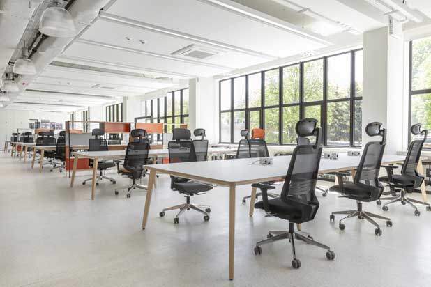 Dot.Pro chairs and Timber tables at the offices in Warsaw (Poland). Photo by Pion Poziom, courtesy of Forma 5.