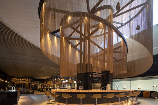 Kriskadecor aluminum curtains in the New LATAM Vip Lounge at the Santiago de Chile Airport. Photo by Grupo Arquitectos, courtesy of Kriskadecor.