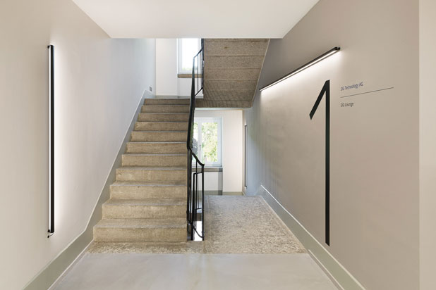 Sticks architectural luminaire by Arik Levi for Vibia at the SIG’s company headquarters in Neuhausen, Switzerland. Photo by Andrin Winteler, courtesy of Vibia.