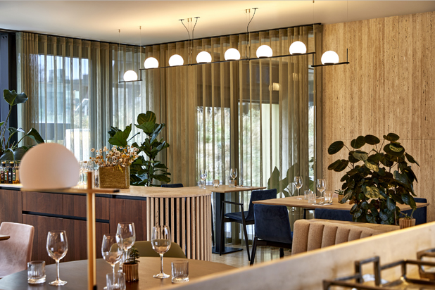 CIRC pendant lamps, designed by Nahtrang for Estiluz at the Hashotel Hotel restaurant. Photo by Tom Jasny, courtesy of Estiluz.