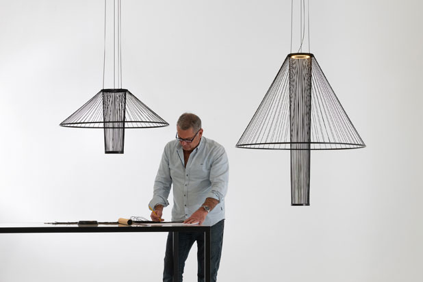 MEDUSA pendant lamps and the designer Fernando Martínez. Photo courtesy of Olé Lighting. 