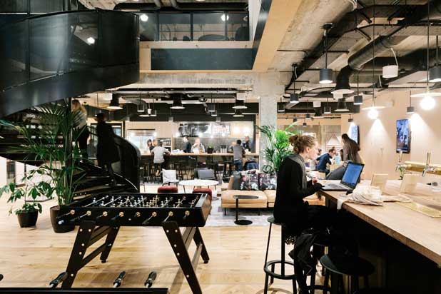 RS3 Wood foosball tables, designed by Rafael Rodriguez, at WeWork. Photo courtesy of RS Barcelona.